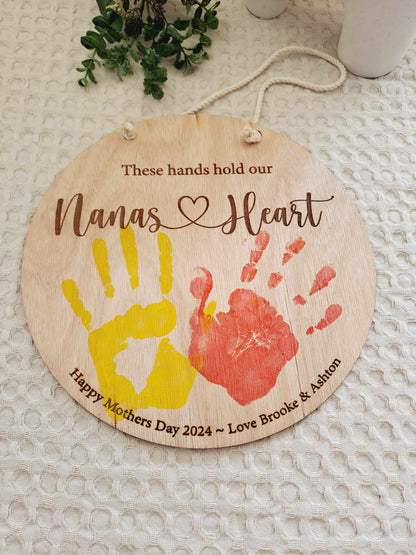 These hands hold our heart plaque